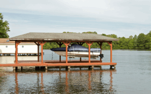 Boat in covered boat hoist in a boat dock