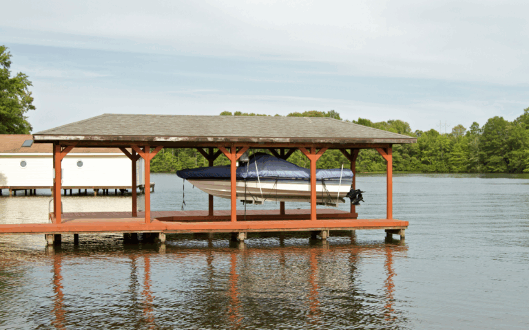 Boat in covered boat hoist in a boat dock