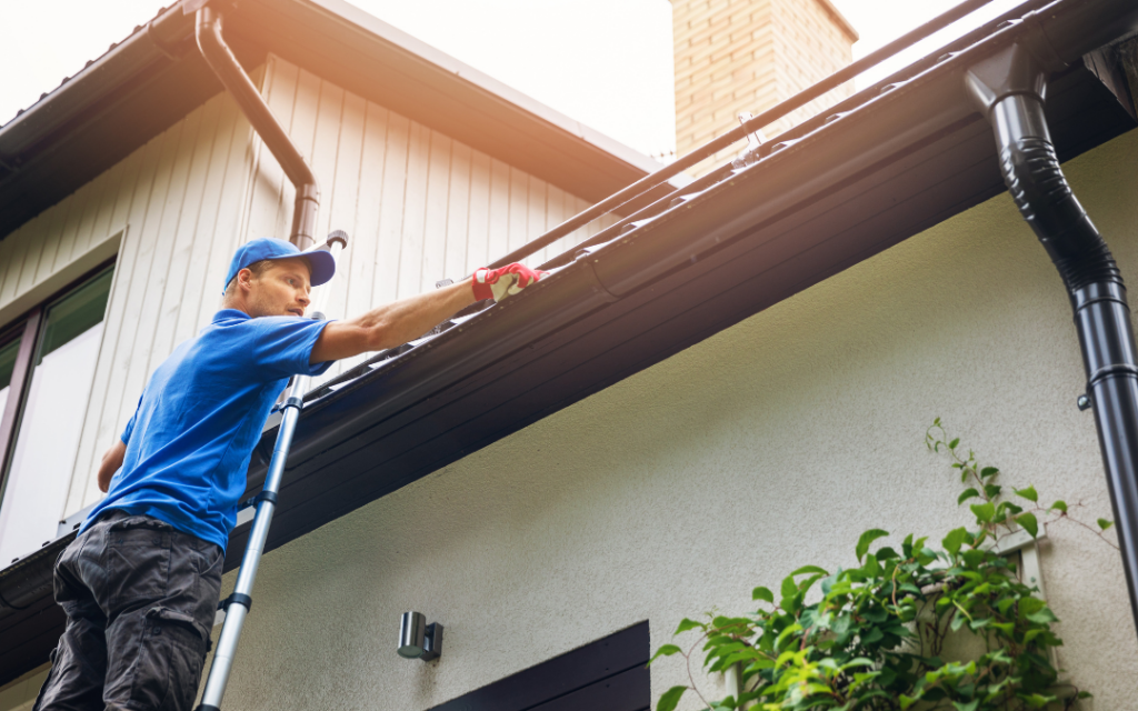 Man inspecting gutter