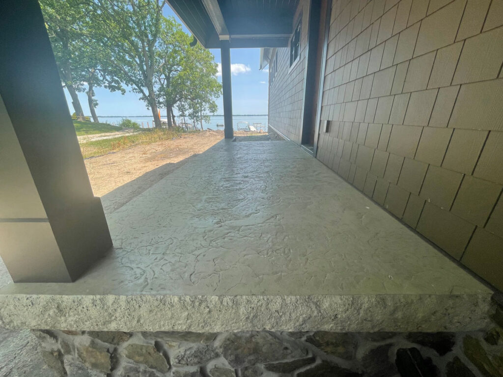 Close-up of a stamped concrete pattern with a contrasting border.