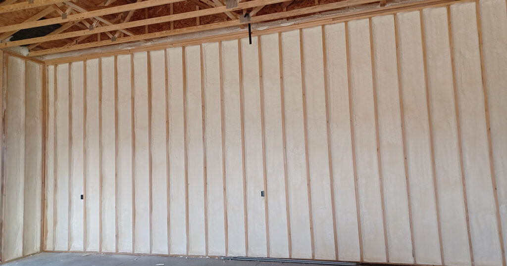 Spray foam insulation applied in an attic to fix a hot upstairs.