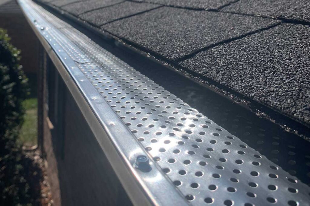 Gutter guards installed over a seamless aluminum gutter on a northwest Iowa home