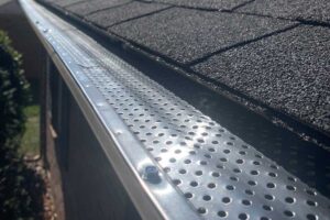 Gutter guards installed over a seamless aluminum gutter on a northwest Iowa home